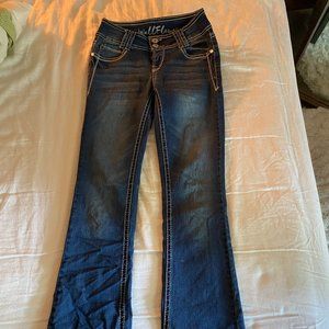 Wallflower, dark blue jeans